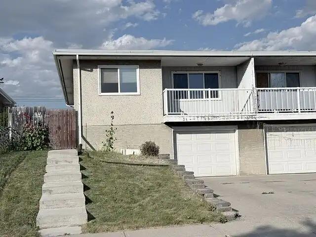 Cozy 3 bedrooms  2 full baths half duplex with single front attached garage