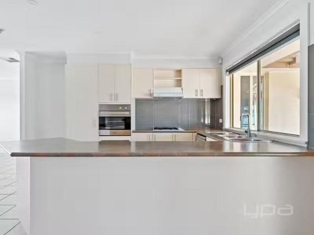 Unique 52 Chisholm Drive, Caroline Springs VIC 3023