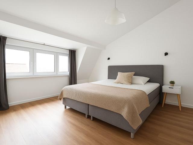 Close to the river and train station – modern apartment in a quiet location