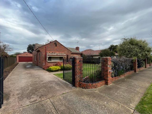 CLASSIC NORTH CENTRAL PERIOD HOME!