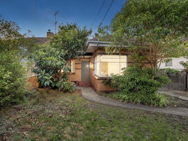 Classic Art Deco Charm with Spacious Backyard