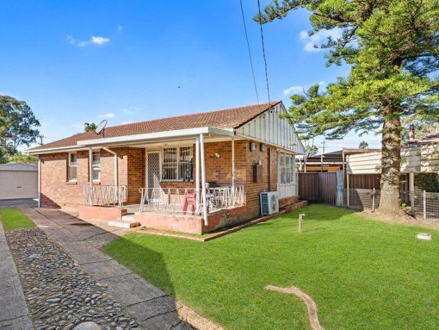 Classic Brick Home on a Generous Block with Endless Potential