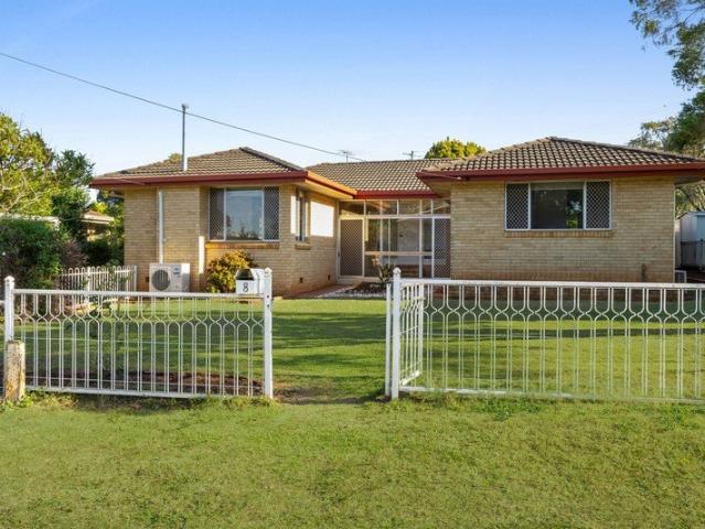 Classic Brick Home with Rare Dual Access
