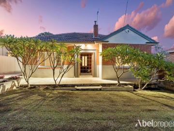 Classic Charm Meets Modern Living Opposite the Park!