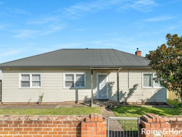 Classic Charm, Modern Comfort and a Generous Backyard
