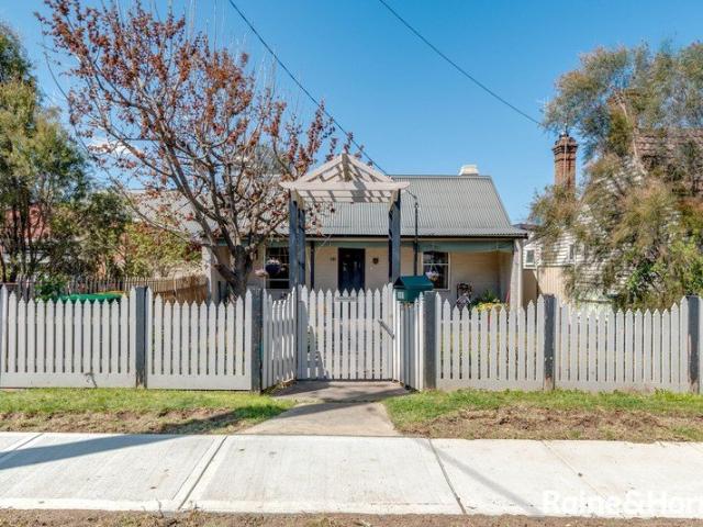 Classic Charm with Modern Comfort in a Convenient Location