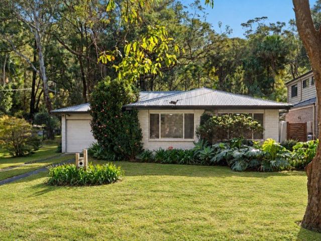Classic Coastal Cottage in a Prime Corner Position