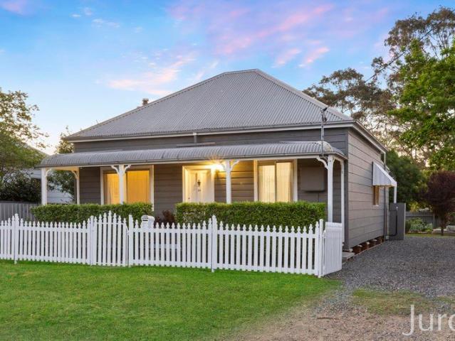 Classic Cottage Charm with Exceptional Shedding & Rear Lane Access