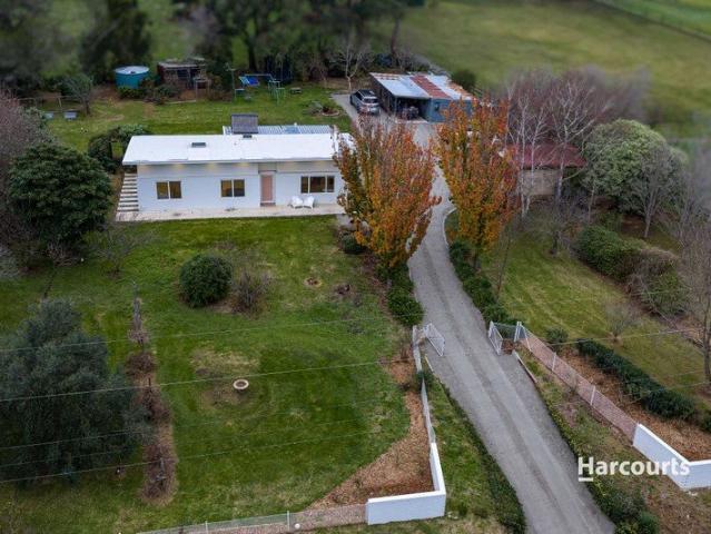 Classic Country Charm, Beautifully Reimagined on One Picturesque Acre