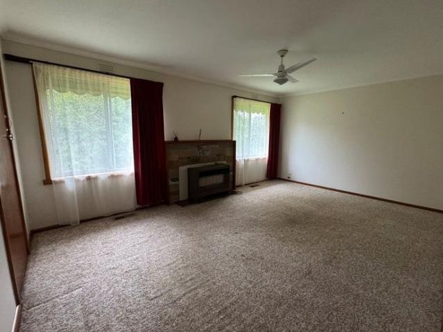 Classic Cream Brick Home Close to Town