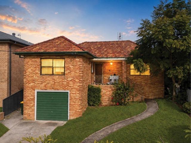 Classic Double Brick Family Home with Lake Views and Endless Potential