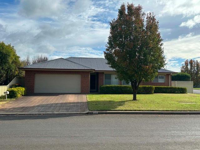 Classic Elegance and Contemporary Design Single level brick home with unmatched quality and in a prime location