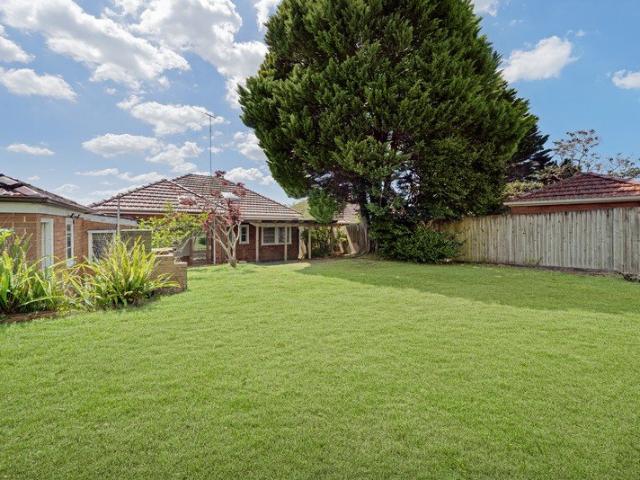 Classic full brick home on generous block with further potential