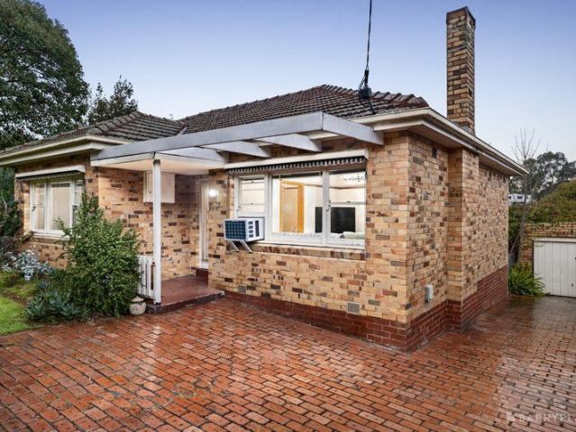 Classic Family Charm on a Spacious Corner Allotment