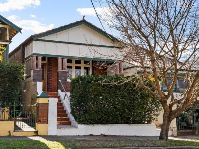 Classic freestanding home on peaceful street