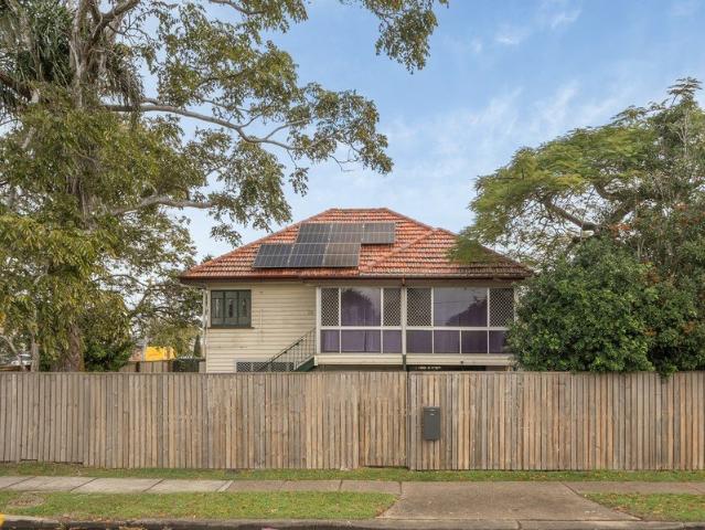 Classic High Set Home with Endless Potential in a Prime Bayside Location