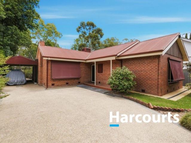 Classic Red Brick Home with creek outlook