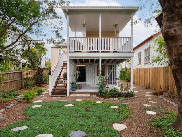 Classic Red Hill Charm with Breezy Outdoor Living
