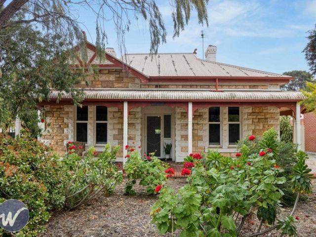 Classic Stone fronted Return Verandah Villa ready to renovate