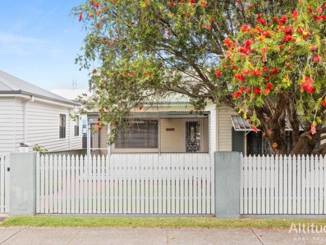 Classic Street Appeal with a Backyard to Match
