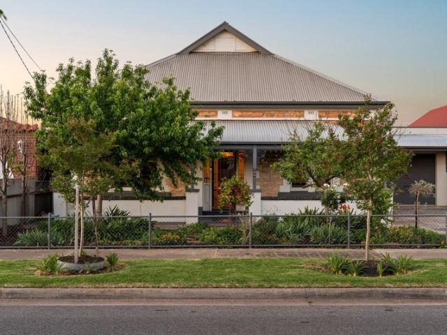 Classic Sandstone Soul Meets Picturesque Poolside Entertaining