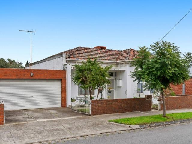 Classic Solid Brick Victorian with Exceptional Access and Endless Potential
