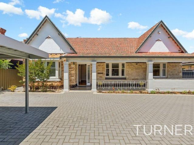 Classic Tudor Charm with Flexible Family Living in a Blue Chip Location