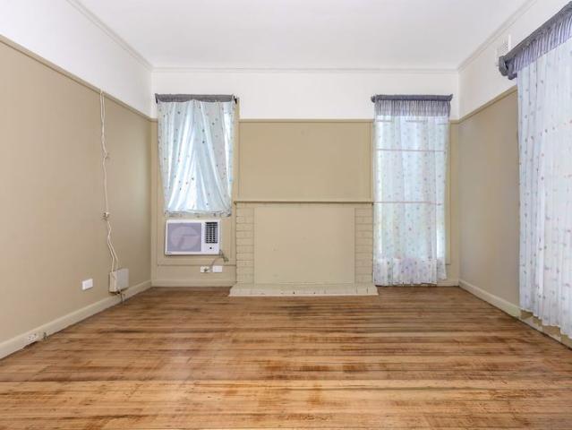 Classic Three Bedroom Home with Spacious Backyard + Side Access