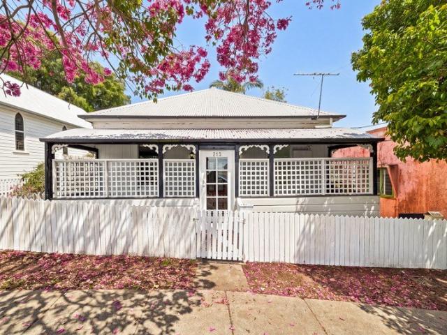 Classic workers cottage with immediate income potential