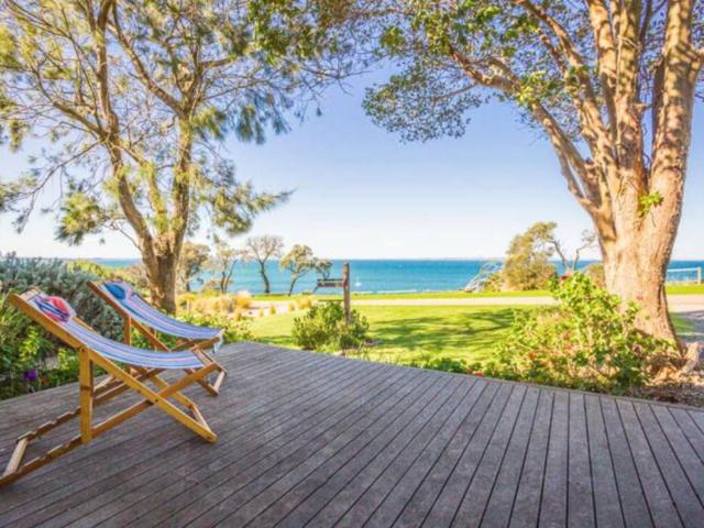 Classic 1960s Beach House with Spectacular Waterfront Views