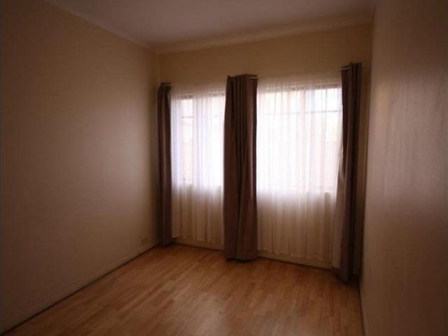 CLEAN, LIGHT AND BRIGHT GROUND FLOOR 1 BEDROOM UNIT SET RIGHT BACK IN THE BLOCK