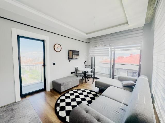Cmhuriyet Mahallesi'nde Deniz Manzaralı 1+1 Eşyalı Kiralık Daire