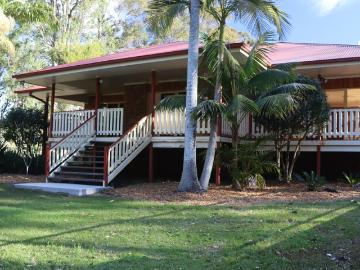 Craftsman built family home on over one hectare with large shedding, pool, private park like grounds in beautiful suburb of Aldavilla