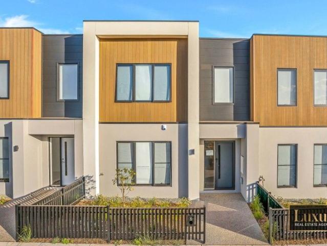 Creekfront Sophistication A Modern 3 Bedroom Townhouse for Sale!