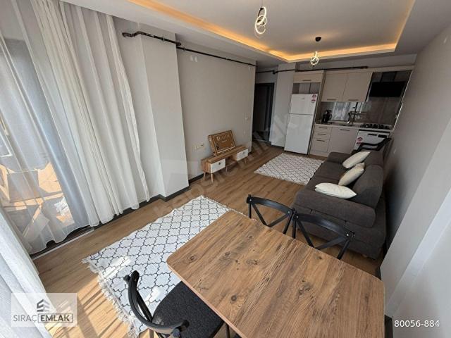 CUMHURİYET MH.LAGOM HOTEL YANI ANA CAD.ÜZERİ SIFIR EŞYALI 1+1