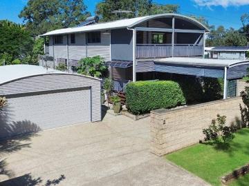 Curves, Character & Coastal Living A Home That Turns Heads!