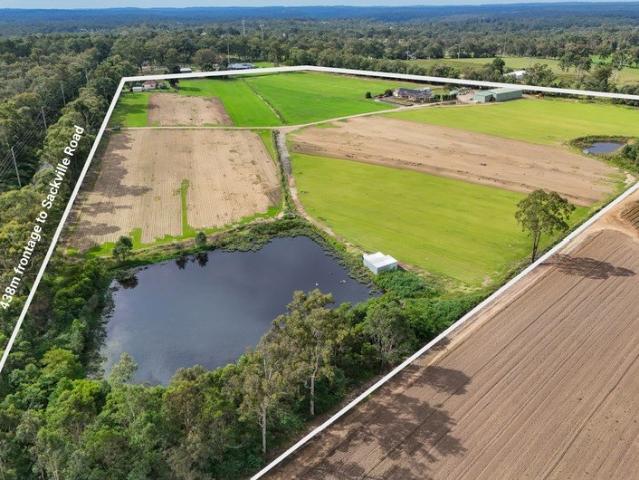 CURRENTLY A TURF FARM SUIT VARIOUS AGRICULTURAL OPPORTUNITES GREAT INCOME STREAM MULTIPLE HOMES PLUS WATER AND SHEDDING. ENDLESS OPPORTUNITIES. !