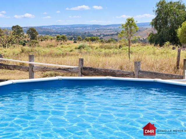CURRENTLY USED FOR DUAL LIVING SEVEN BEDROOM, THREE BATHROOM SETUP WITH MILLION DOLLAR VIEWS
