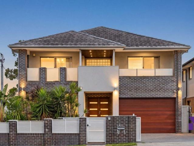 Custom built entertainers family' home catered to versatility, style and function with inground pool