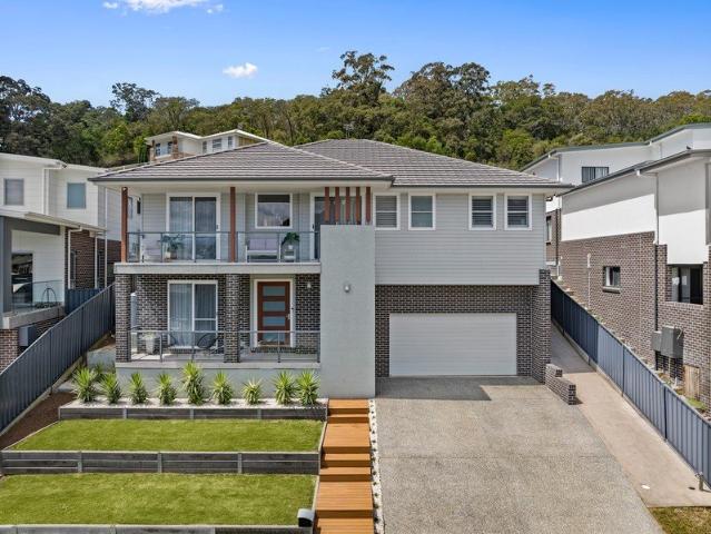 CUSTOM BUILT LUXURY MEETS FAMILY LIVING