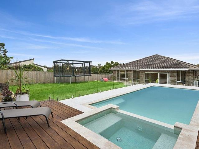 Custom designed family paradise in beaches' heart
