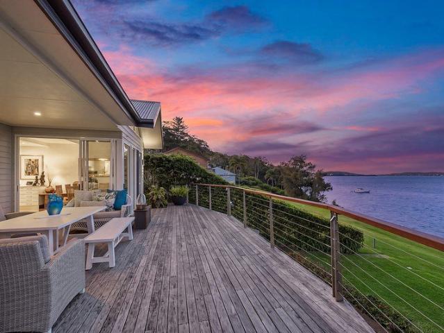 Custom waterfront home with guest house