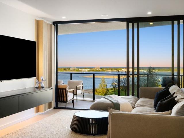 Custom Upgraded Near New Apartment with Sweeping Broadwater Outlook