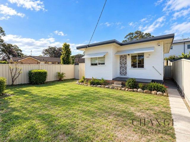 Cute as a Button A Charming Home with Gorgeous Backyard!