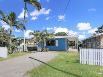 CUTE AS A BUTTON BEACH HOUSE WITH RENTAL INCOME
