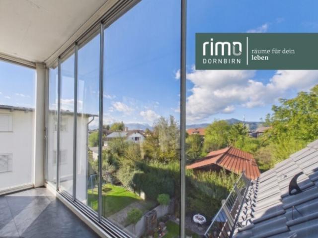 Dachgeschosswohnung mit Wintergarten und Fernsicht