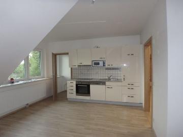 DACHGESCHOSSWOHNUNG MIT GEMEINSCHAFTSGARTEN IN AUSGEZEICHNETER WOHNLAGE