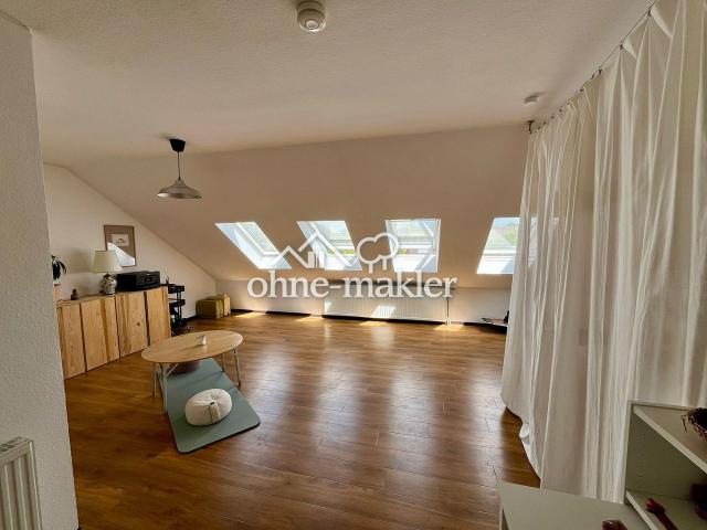 Dachgeschosswohnung mit Loft Charakter und Balkon