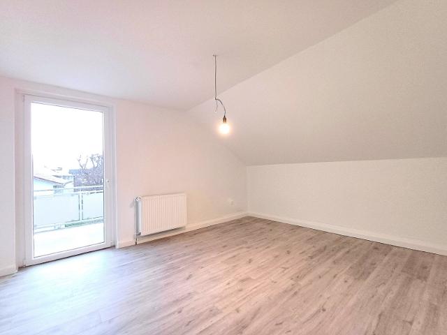 Dachgeschosswohnung in gepflegtem Wohnhaus