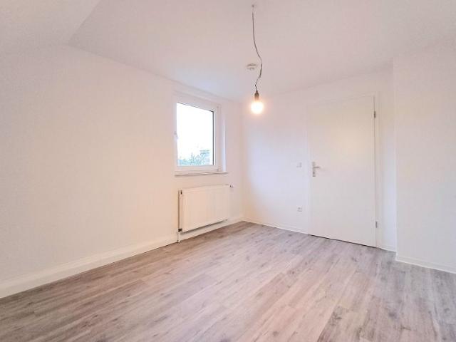 Dachgeschosswohnung in gepflegtem Wohnhaus